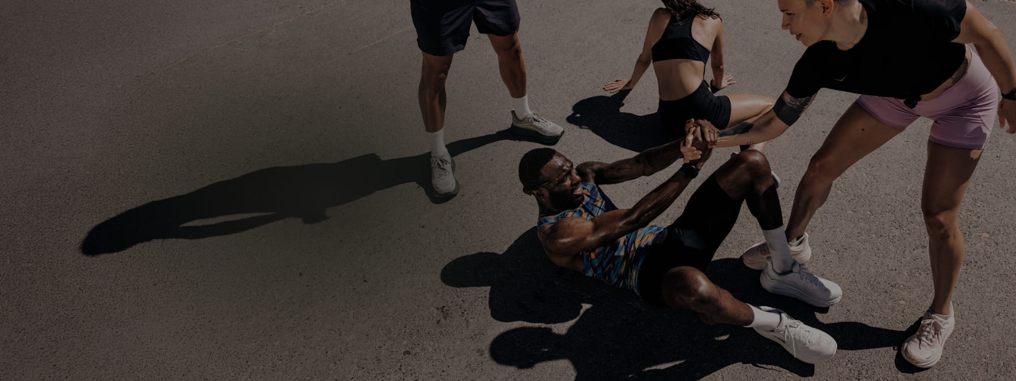 Two people preparing for some night trail-running.