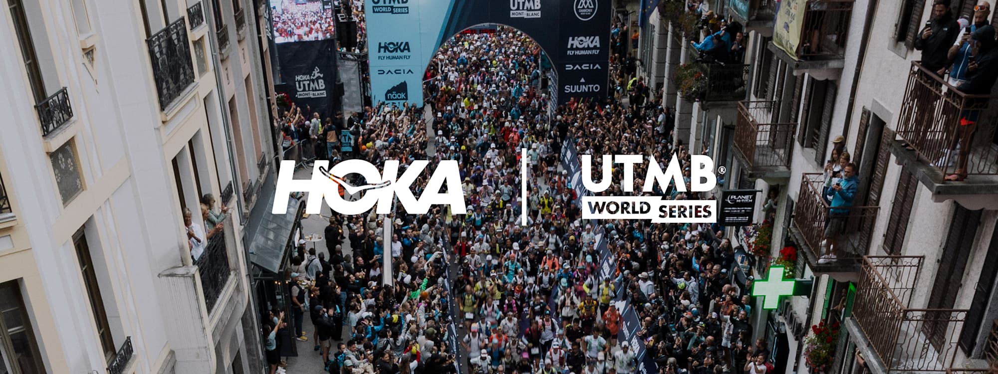 A sky view of the racers and audience, with the HOKA and UTMB World series logos.