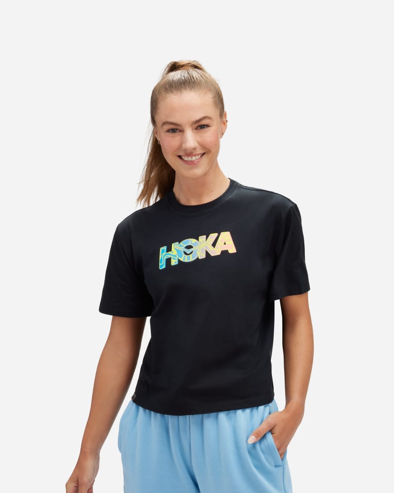 HOKA Women's Topo Logo Short Sleeve in Black, Size Small