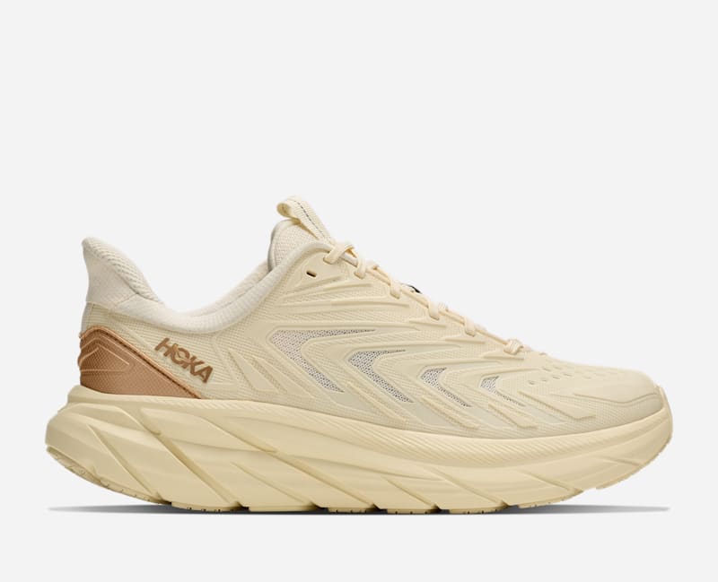 HOKA Women's Clifton UTL Shoes in Vintage Yellow/Gold, Size 9