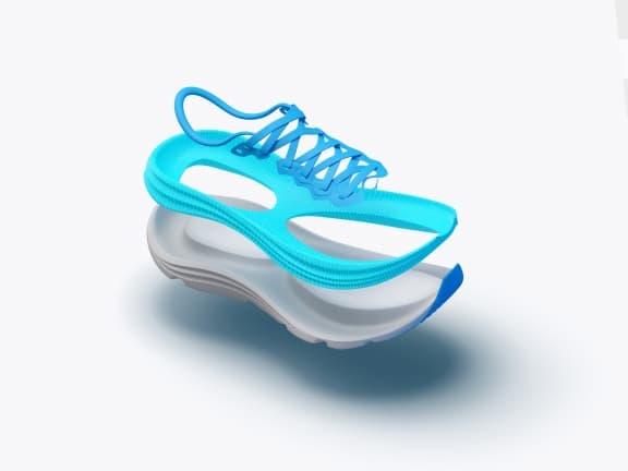 Exploded view of a running shoe: blue upper with laces above white sole.