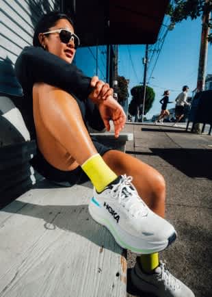 Collage of individuals wearing Hoka shoes across diverse activities and settings.