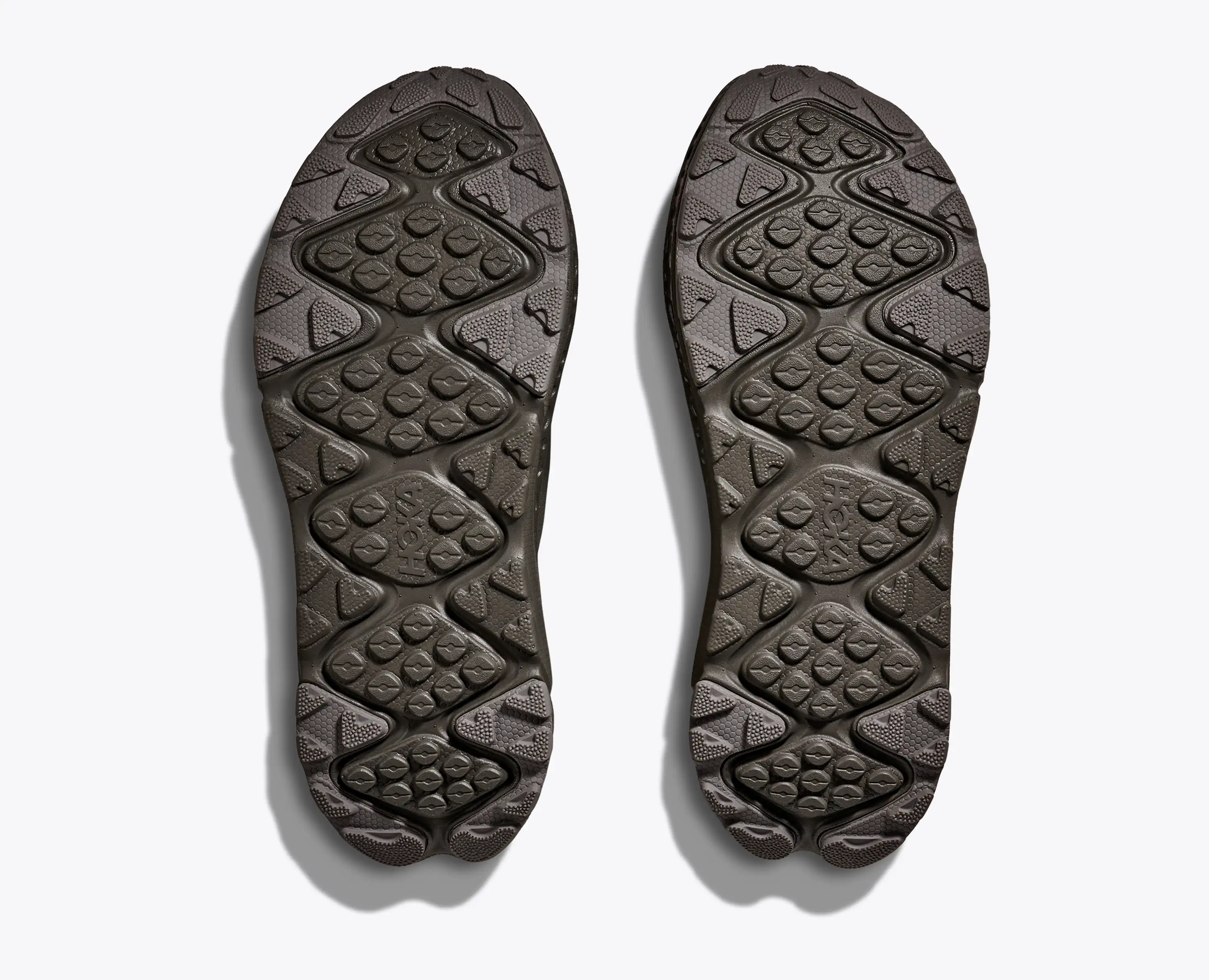 Underside of the Hoka Ora Primo showing the lugged outsole