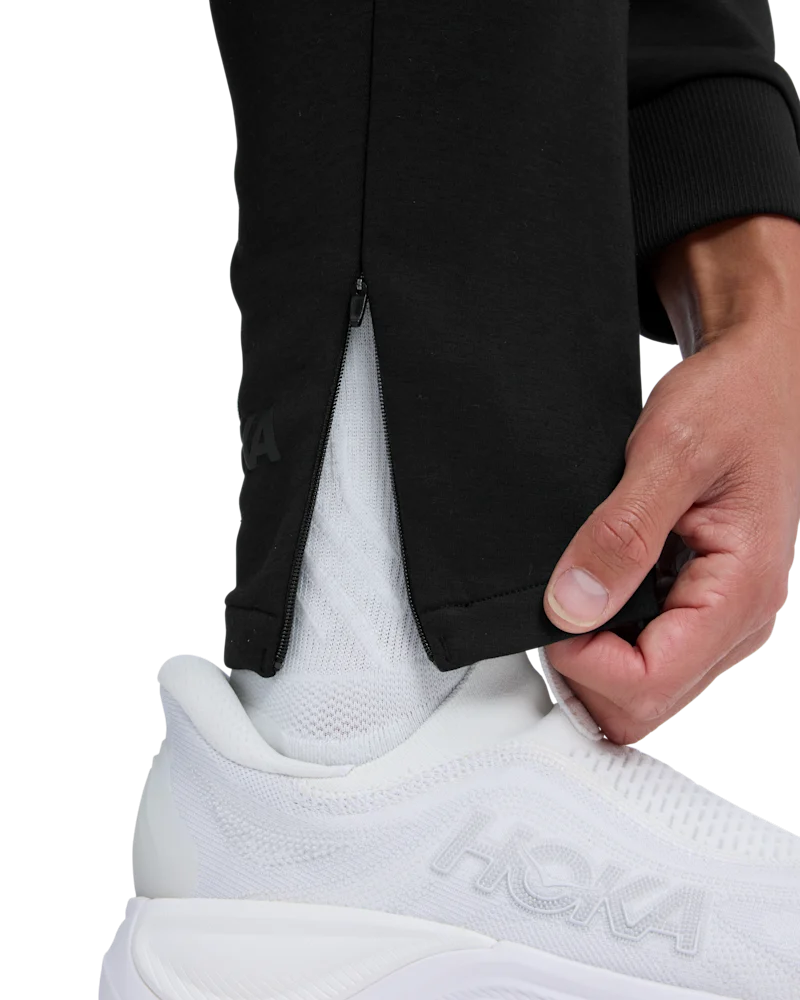 Ouvertures de jambe zippées pour un enfilage et un retrait faciles