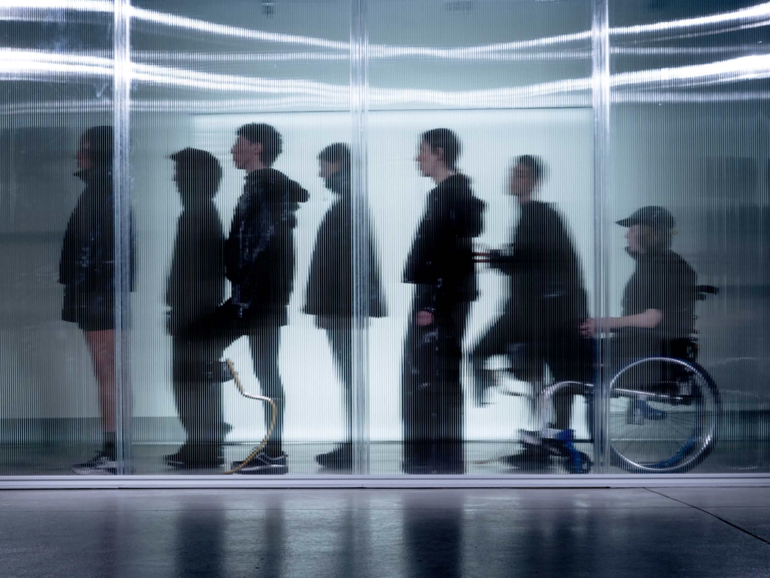 Image showing attendees queuing at the HOKA brand activation at Milan Fashion Week, February 2026.