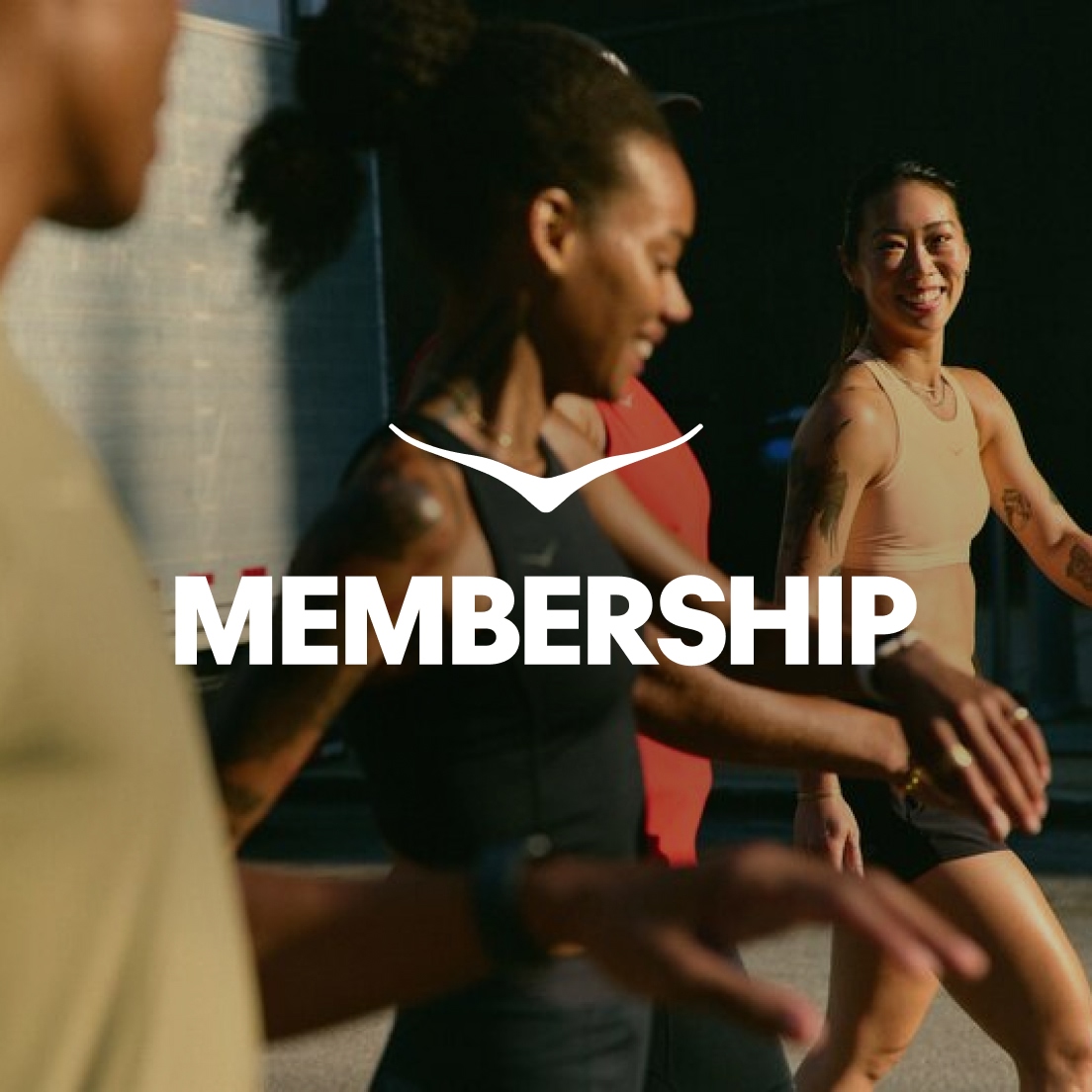 White logo & 'MEMBERSHIP' text over smiling individuals in athletic wear outdoors.