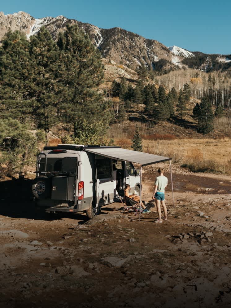 A couple camping in the mountains A couple camping in the mountains
