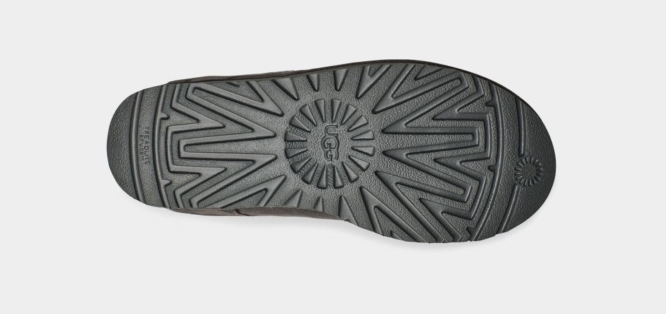 Tall gray ugg boots with shop bows