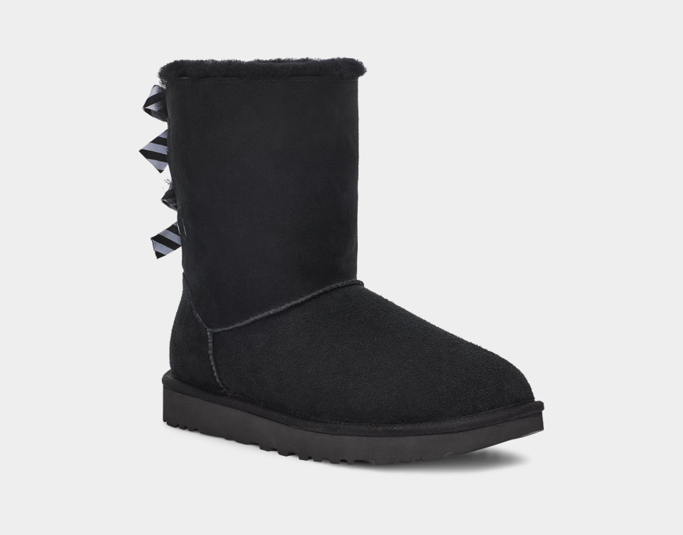 Boots with discount bows on side