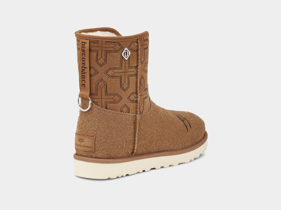 Ugg boots with ugg written all over it top