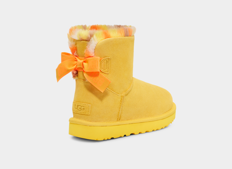 Yellow uggs with bows deals