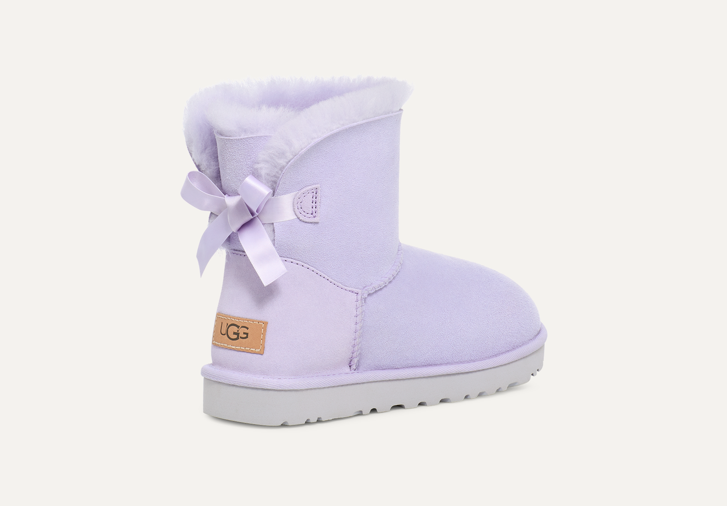 Light purple uggs with bows on sale