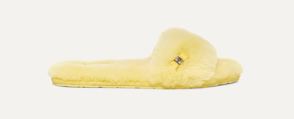 Yellow fluffy ugg slides cheap