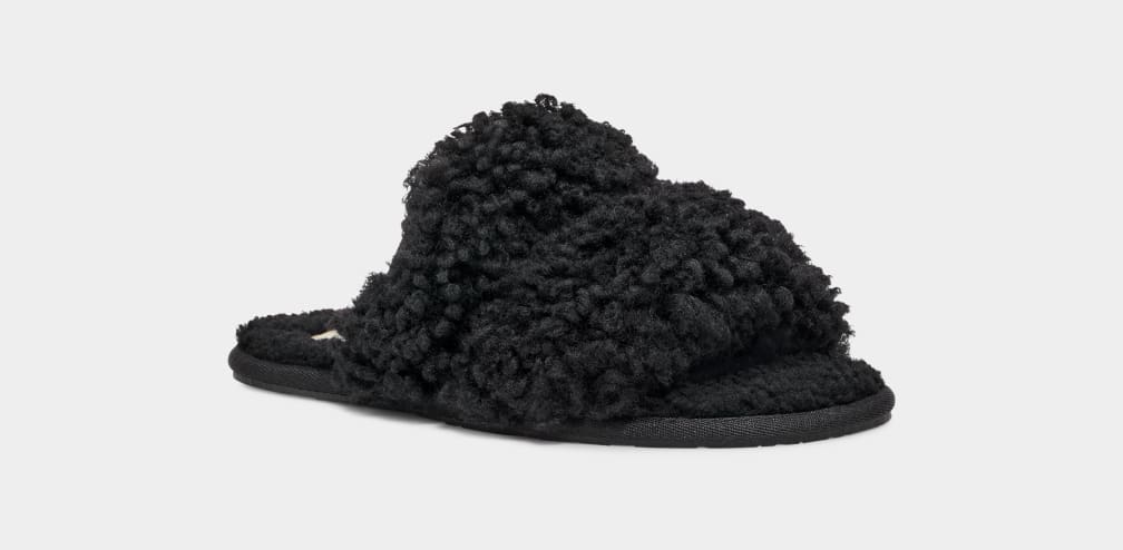 Black fuzzy best sale ugg slippers