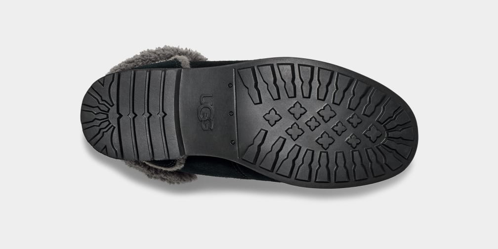 Furry ugg boots black store