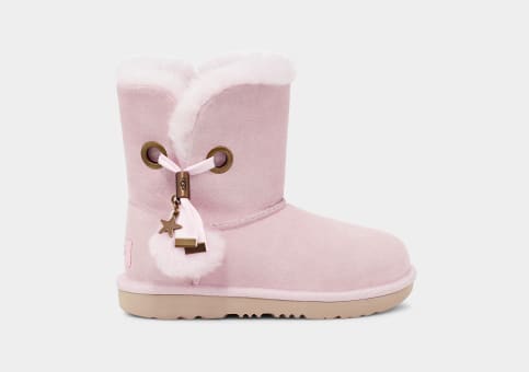 Pink ugg boots with 2025 pom poms
