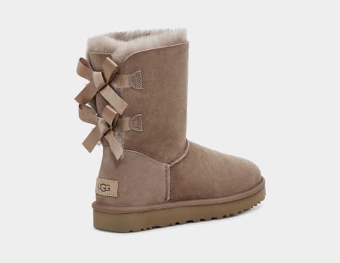 Brown uggs top with pink bows