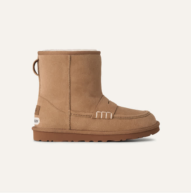 A studio shot of UGG JW Anderson loafer boot in chestnut.