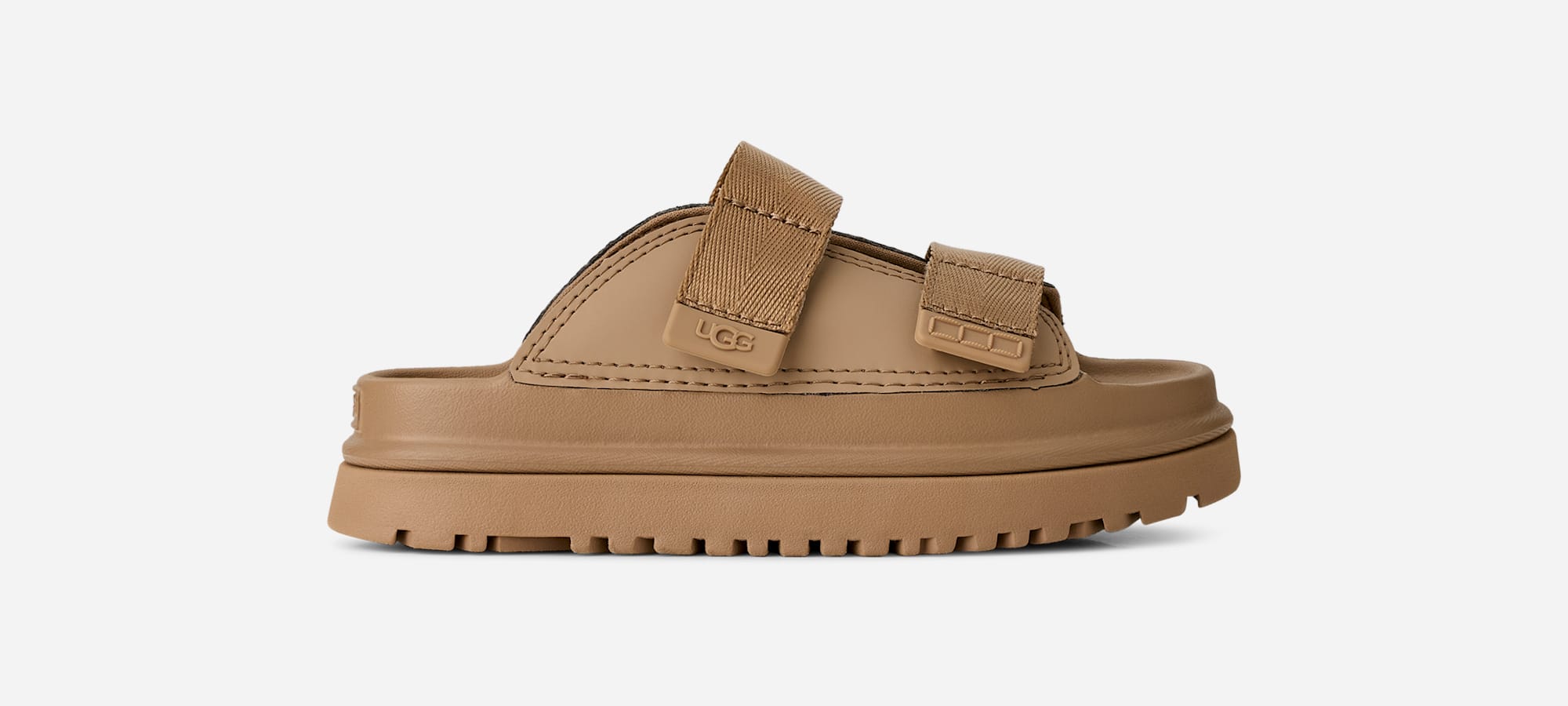 UGG® GoldenGlow Slide for Kids in Dark Sand