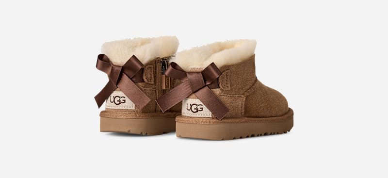 UGG® Toddlers' Ultra Mini Bailey Bow Sheepskin Classic Boots