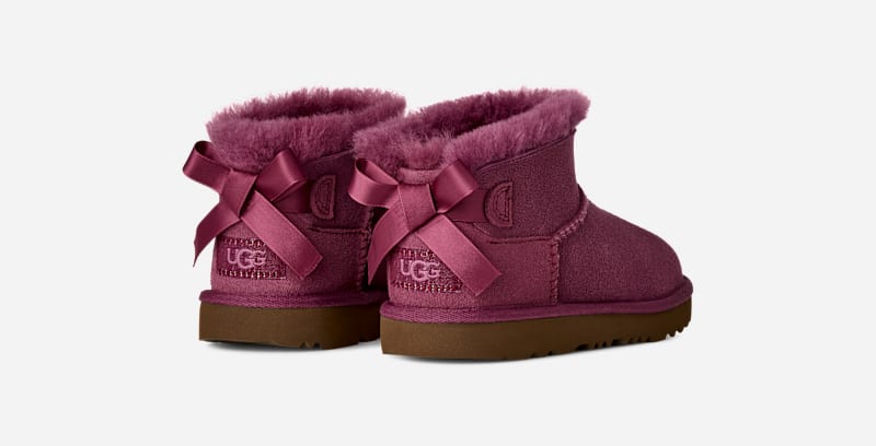 UGG® Ultra Mini Bailey Bow Boot in Dark Winterberry, Size 13K, Polyester/Wool