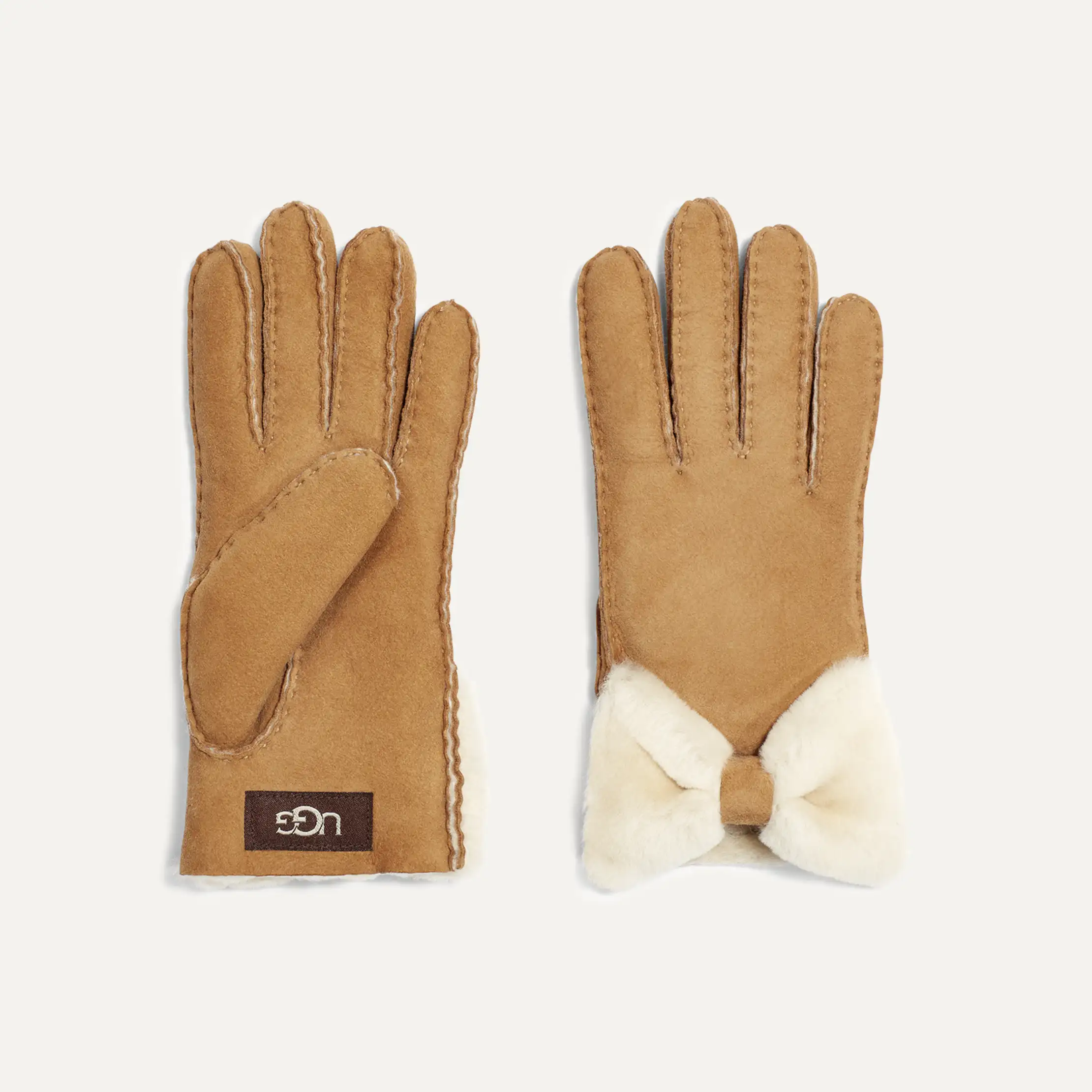 UGG オーストラリア Bow Tech Gloves UGG Sheepskin Bow Glove for Women | UGG® UK